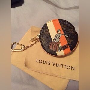 Authentic limited edition Louis Vuitton coin pouch with bag chain
